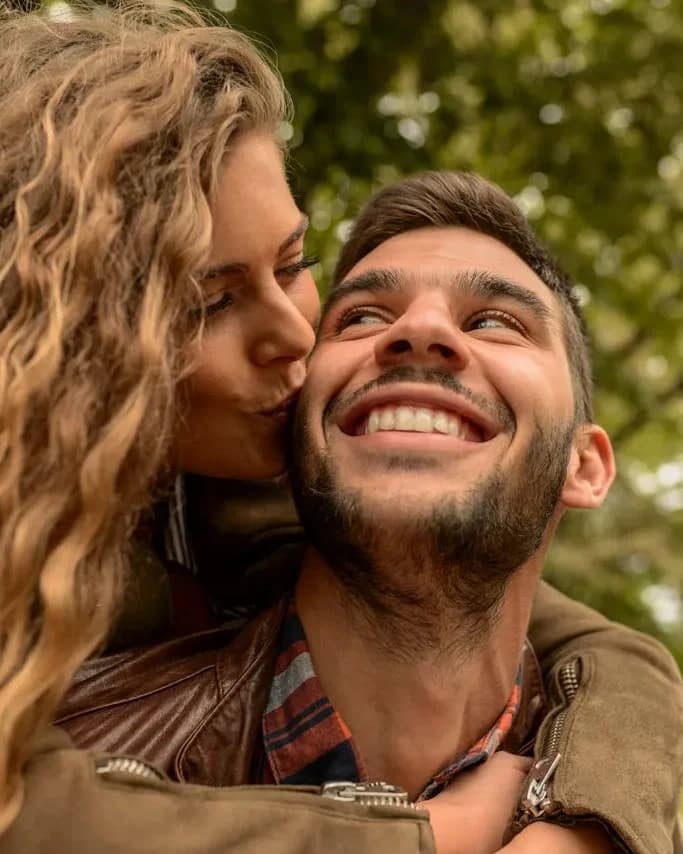A couple sharing a relaxed moment outdoors